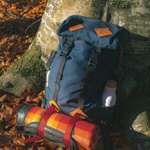 blue and beige camping backpack
